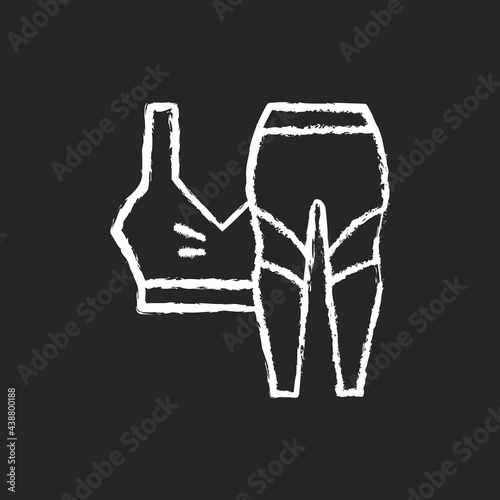 Workout clothes chalk white icon on dark background. Female sportswear. Bra top and leggings. Pants, shirt for gym activity. Homewear and sleepwear. Isolated vector chalkboard illustration on black