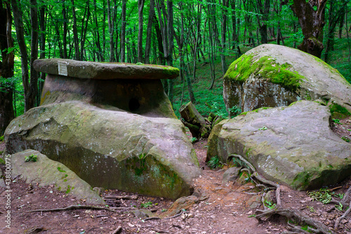 dolmen in Tuapse. A megalytic construction in the woods of Kuban. photo