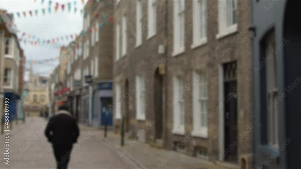 Defocused Tracking Shot Down a Quiet English Shopping Street Defocused Tracking Shot Down a Quiet English Shopping Street