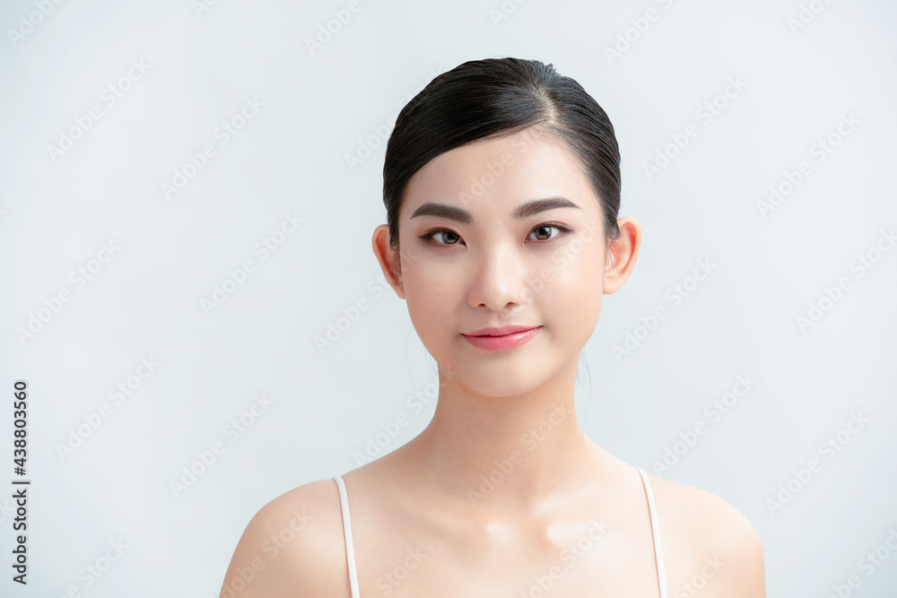 Beautiful Young asian Woman with Clean Fresh Skin look. Beautiful Young asian Woman with Clean Fresh Skin look.