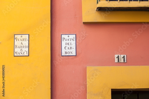 Colorful painted houses. Historic district of Seville, Spain