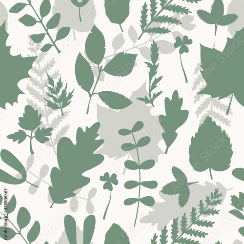 Seamless vector pattern with herbarium leaves and flowers in a simple style.