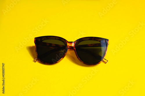 Sunglasses on a yellow background
