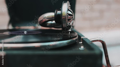 Vintage video of an old gramophone playing a record, close-up.