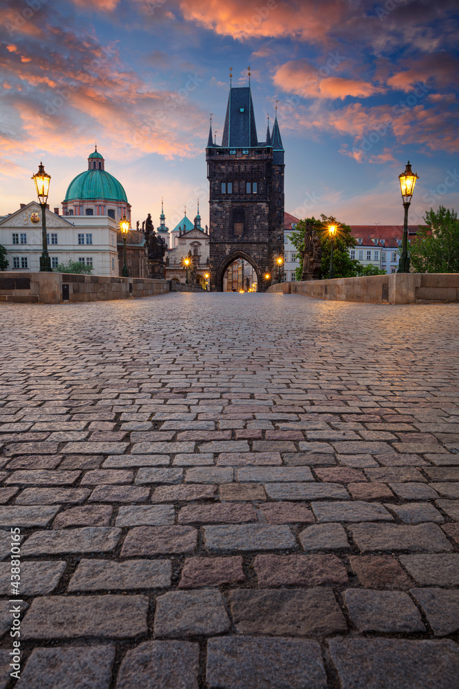Prague, Charles Bridge. Cityscape image of iconic Charles Bridge with Old Town Bridge Tower in Prague, Czech Republic at sunrise.
