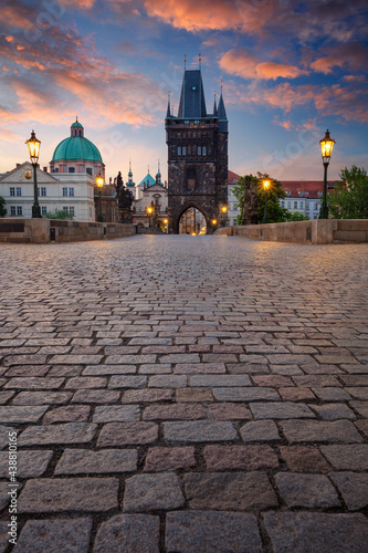 Prague, Charles Bridge. Cityscape image of iconic Charles Bridge with Old Town Bridge Tower in Prague, Czech Republic at sunrise.