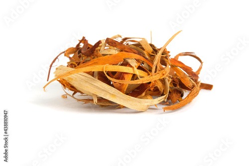 Front view shaved wood of Caesalpinia sappan L. or commonly call Kayu Secang or Sepang in Indonesia, isolated on white background. Traditional herb medicine alternative raw material.