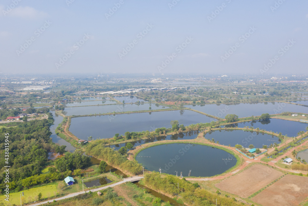 Aerial view from flying drone of Fish pond, fish farm