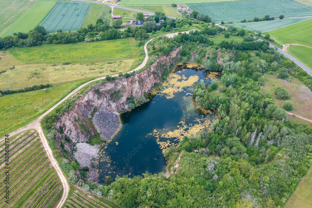 View from above of a disused quarry that has filled with water near Neu Bamberg / Germany 