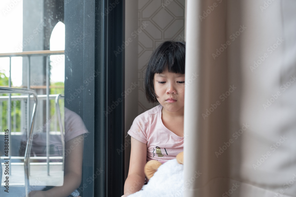 mother hit her kid, children crying, feeling sad, young girl unhappy, family violence concept, selective focus and soft focus mother hit her kid, children crying, feeling sad, young girl unhappy, family violence concept, selective focus and soft focus