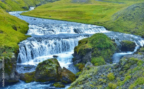 Mossy Rock Surrounding Waterfall in Iceland