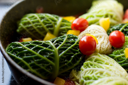 Сlose-up of stuffed Cabbage Rolls are loaded with a tender and juicy ground beef and rice filling, wrapped up in a boiled cabbage leaf, gluten-free,
 and lower-carb comfort food dish your family is su