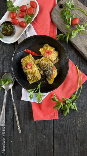 Savoy cabbage rolls with meat, rice and vegetables. Stuffed savoy cabbage leaves with meat. Chou farci, dolma, sarma, sarmale, golubtsy or golabki -popular dish in many countries. 