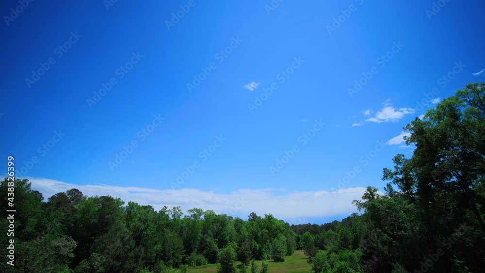 Bright sunny day, storm clouds appearing over time, time lapse Bright sunny day, storm clouds appearing over time, time lapse