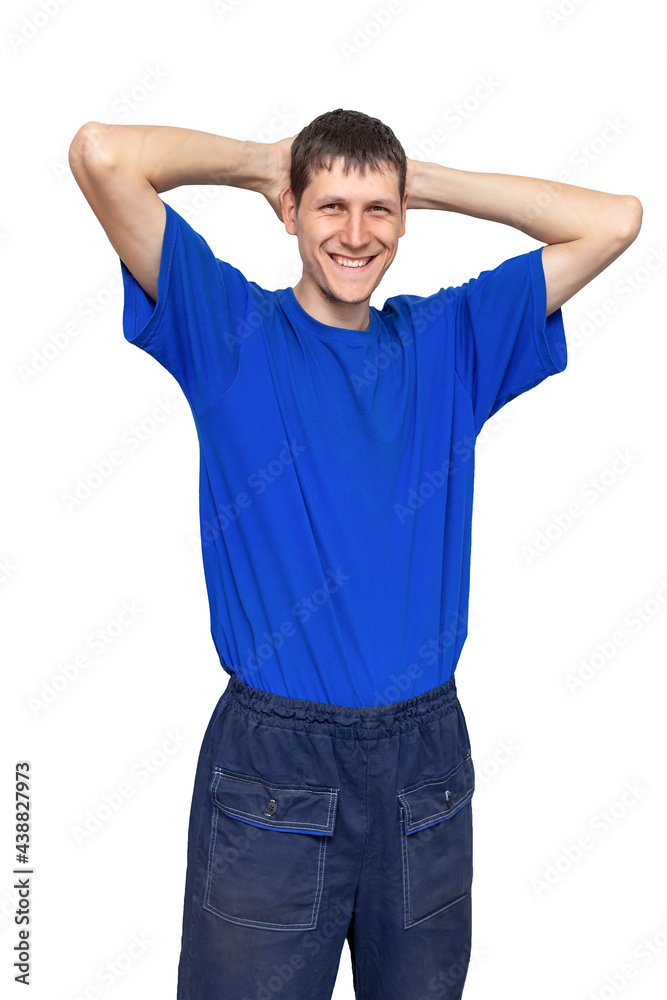 Advertising of workwear. Portrait of a relaxed and positive guy in work pants and a blue T-shirt. Isolated on a white background. Advertising of workwear. Portrait of a relaxed and positive guy in work pants and a blue T-shirt. Isolated on a white background.