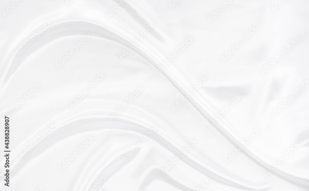 White gray satin texture that is white silver fabric silk background with beautiful soft blur pattern natural.