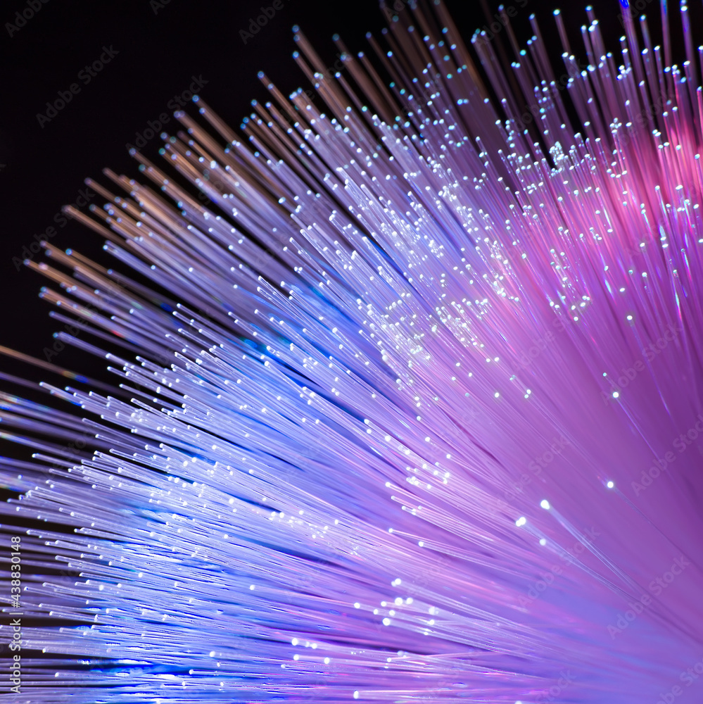 Fiber optics network cable on technology background Stock Photo | Adobe ...