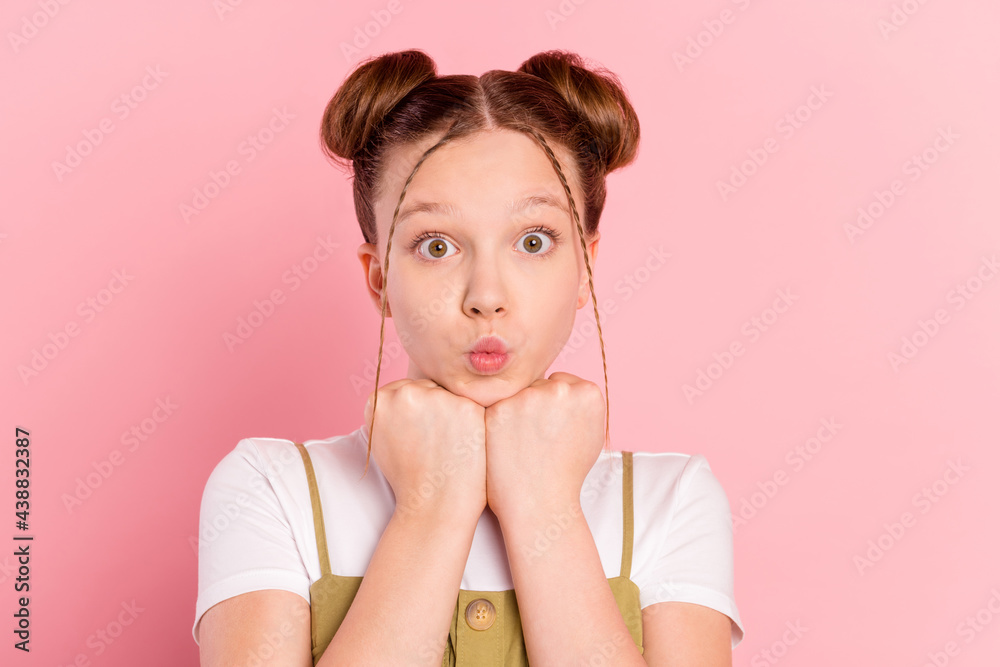 Portrait of attractive girlish naughty foxy girl sending you air kiss isolated over pink pastel color background Portrait of attractive girlish naughty foxy girl sending you air kiss isolated over pink pastel color background