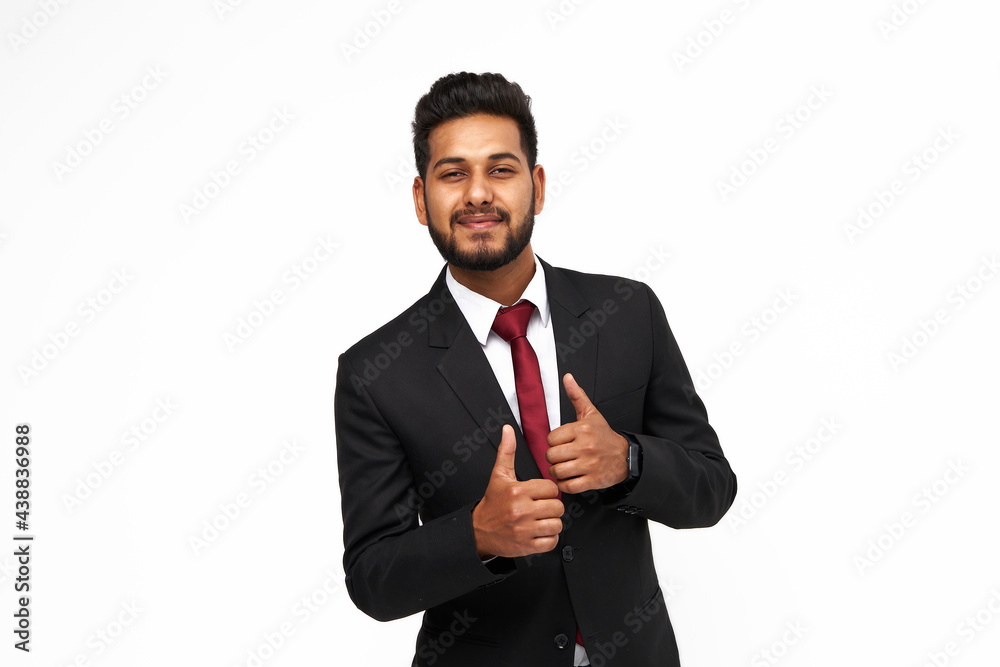 Portrait of young happy indian business man on white isolated background looking to the camera. Portrait of young happy indian business man on white isolated background looking to the camera.