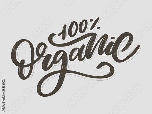 Organic brush lettering. Hand drawn word organic with green leaves. Label, logo template for organic products, healthy food markets.