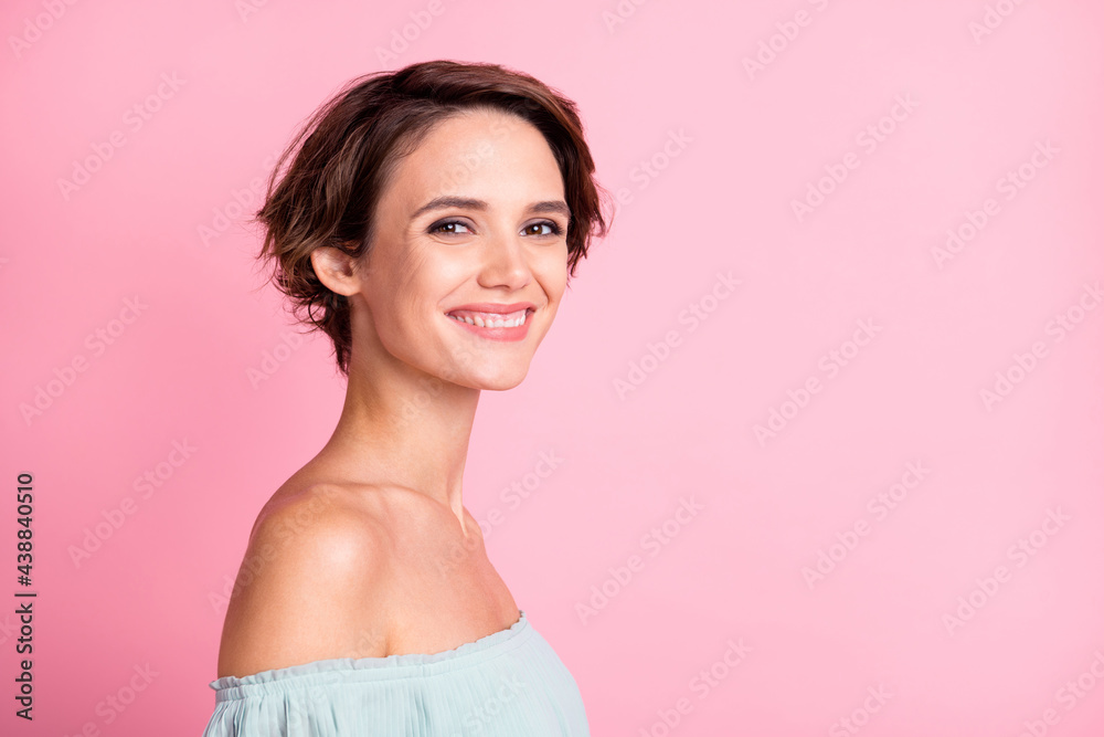 Profile side photo of young cheerful woman happy positive smile adorable pretty isolated over pastel color background Profile side photo of young cheerful woman happy positive smile adorable pretty isolated over pastel color background