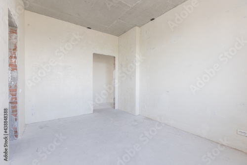 interior of the apartment without decoration in gray colors © gluschenkoart