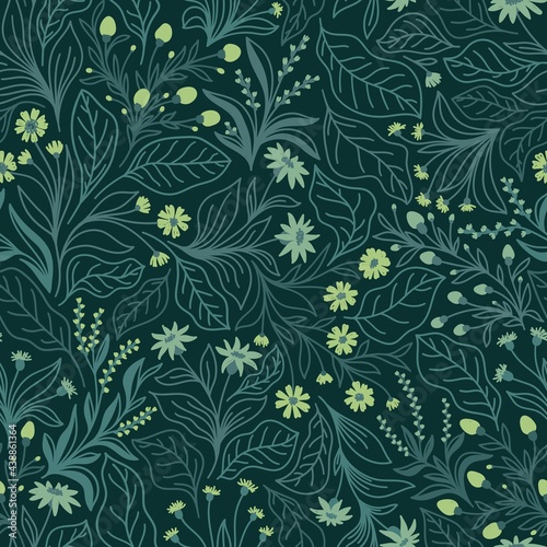Seamless pattern with different wildflowers and leaves on an emerald background in vector