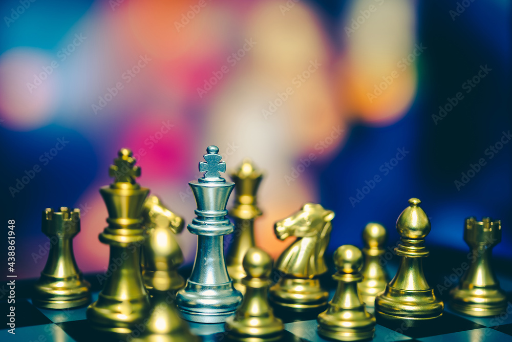 Closeup of chess characters on board games. to represent decision making in term of business strategy to find out the best solution to meet target objective and goal.