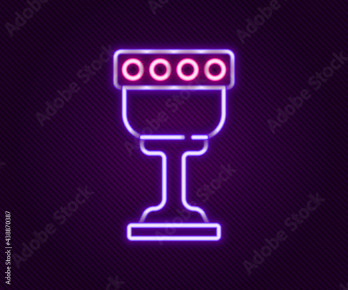Glowing neon line Medieval goblet icon isolated on black background. Holy grail. Colorful outline concept. Vector