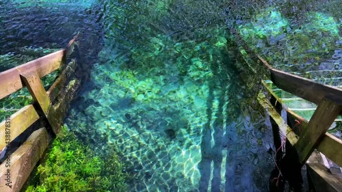 Staircase leading into clear blue water