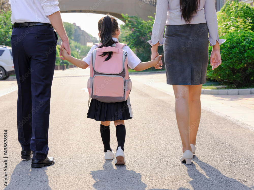 Young parents send their children to school Young parents send their children to school