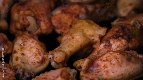 Cooking chicken drumstick legs on grill 1 photo