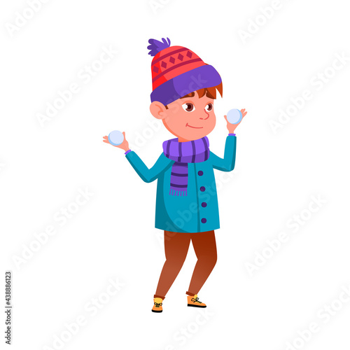 playful boy holding snowballs cartoon vector. playful boy holding snowballs character. isolated flat cartoon illustration