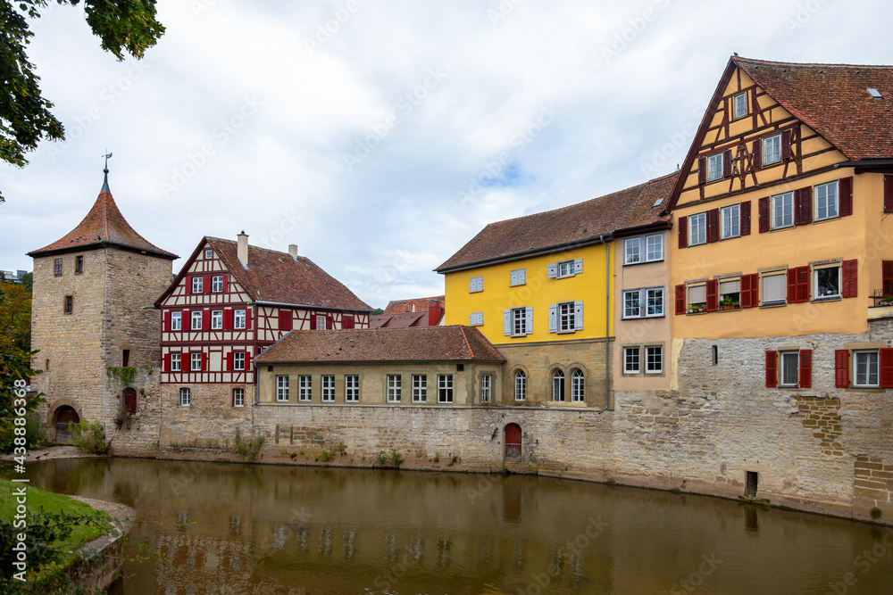 Old tower and historic, medieval half-timbered houses in the historic center of Schw bisch Hall on the Kocher river, Baden-Wurttemberg, Germany.