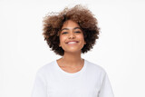Portrait of laughing african girl in white t-shirt looking at camera, isolated on gray background