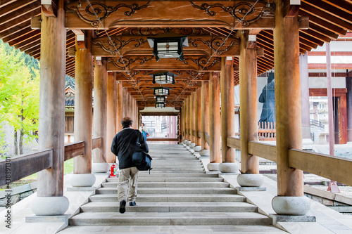 This centuries-old wooden pathway leads to one of the largest Buddhist temples in Japan, in the province of Fukui photo