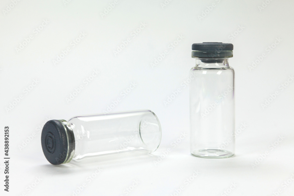 Glass bottle for vaccines on white background Glass bottle for vaccines on white background