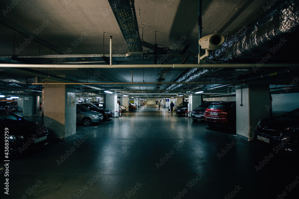 Inside underground car parking. Modern parking lots