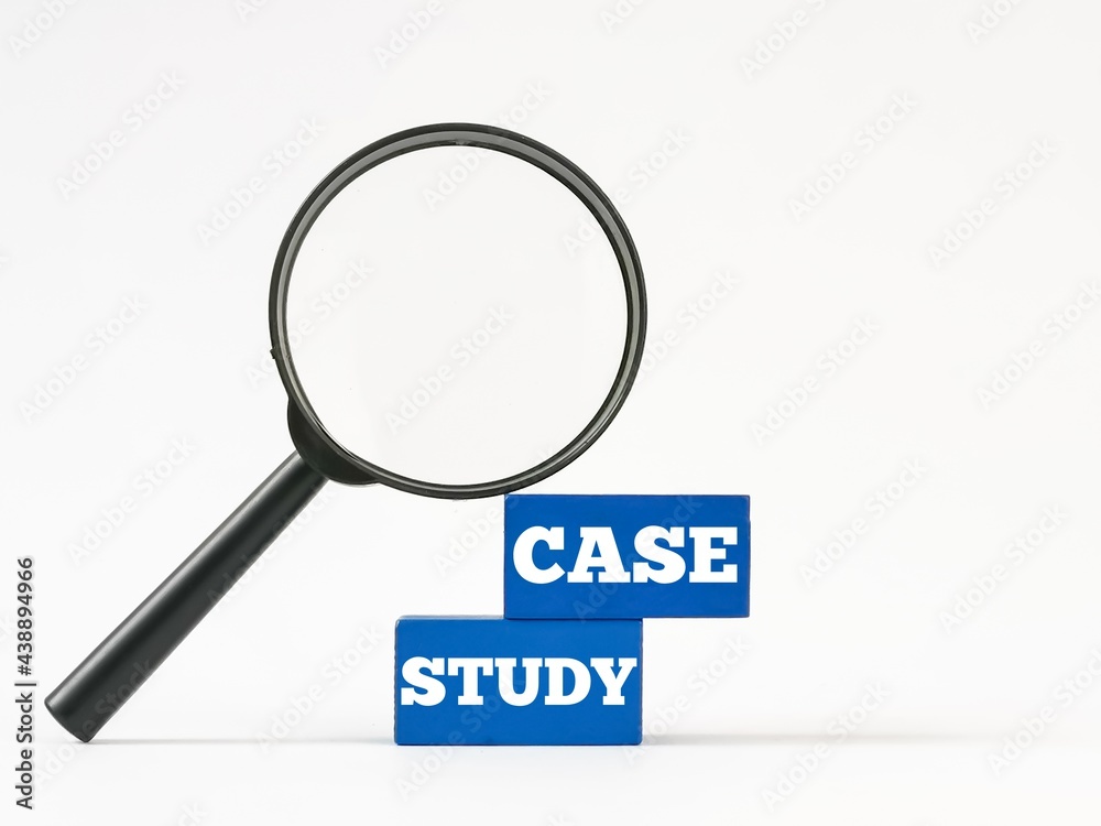 Text case study written on blue wooden blocks with magnifying glass against white background. Text case study written on blue wooden blocks with magnifying glass against white background.