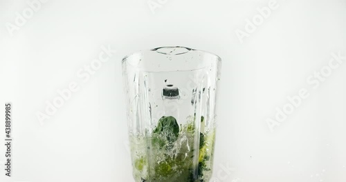 Wallpaper Mural Green fresh vegetables and fruits falls in to the blender with water and blends Torontodigital.ca