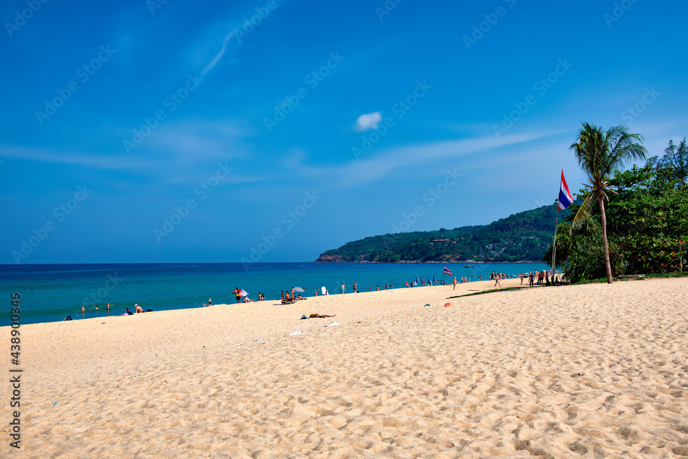 Thailand - March, 2019 : Tourists enjoy sightseeing and play activities on the Karon beach in summer, Phuket