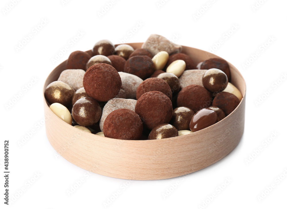Delicious chocolate candies in box on white background Delicious chocolate candies in box on white background