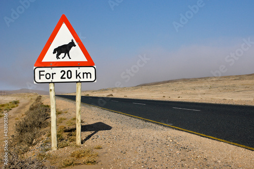 Warning sign for brown hyenas on highway, Namibia photo