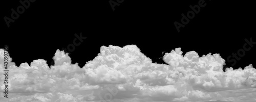 Large white clouds on black horizontal, isolated