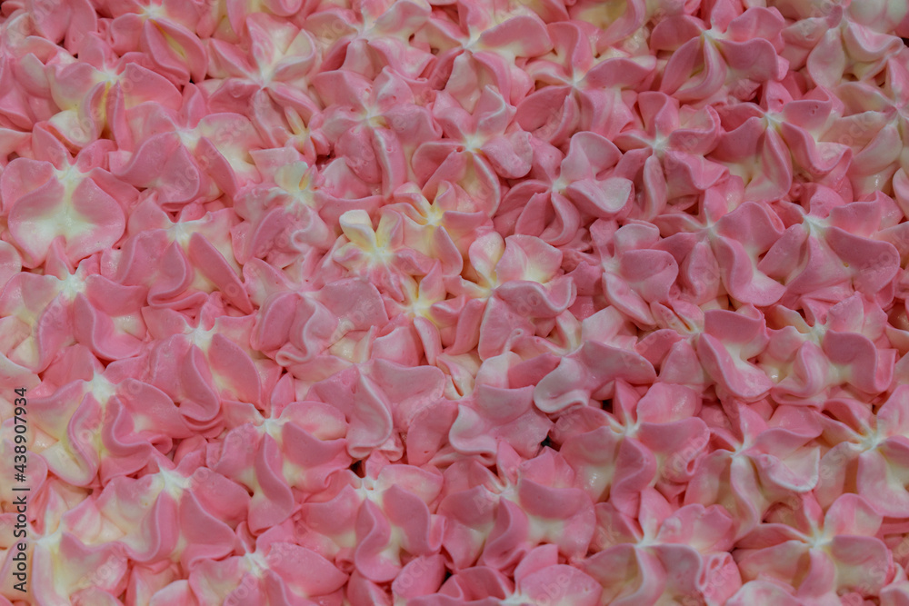Fototapeta premium Cream stars on cake for background. Color - Mauve Taupe Hue Red, white Hue yellow. Sweet backdrop concept.