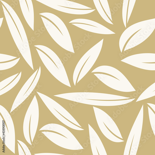 Seamless elegant pattern with white hand drawn leaves on a golden background. The pattern can be used for wrapping papers, invitation cards, wallpapers, covers, textile prints. Vector, eps 10.