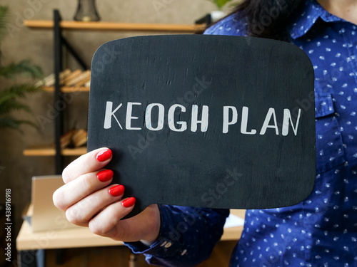 Business concept meaning KEOGH PLAN with sign on the sheet.