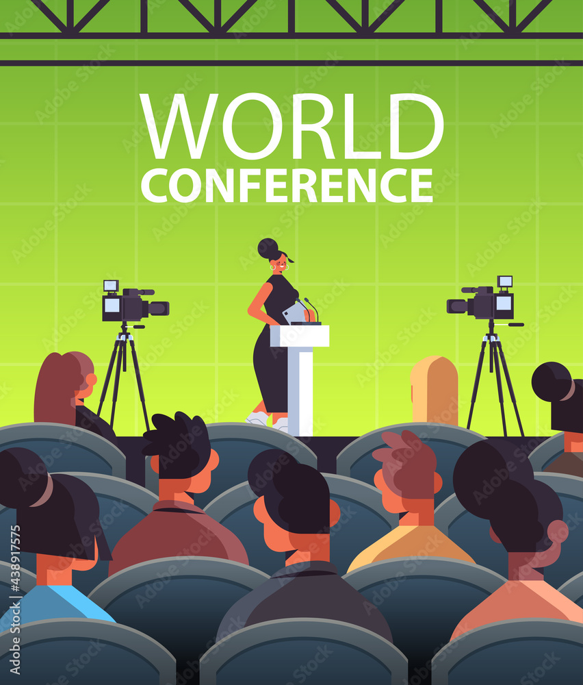 Obraz premium businesswoman giving speech at tribune with microphone on corporate international world conference