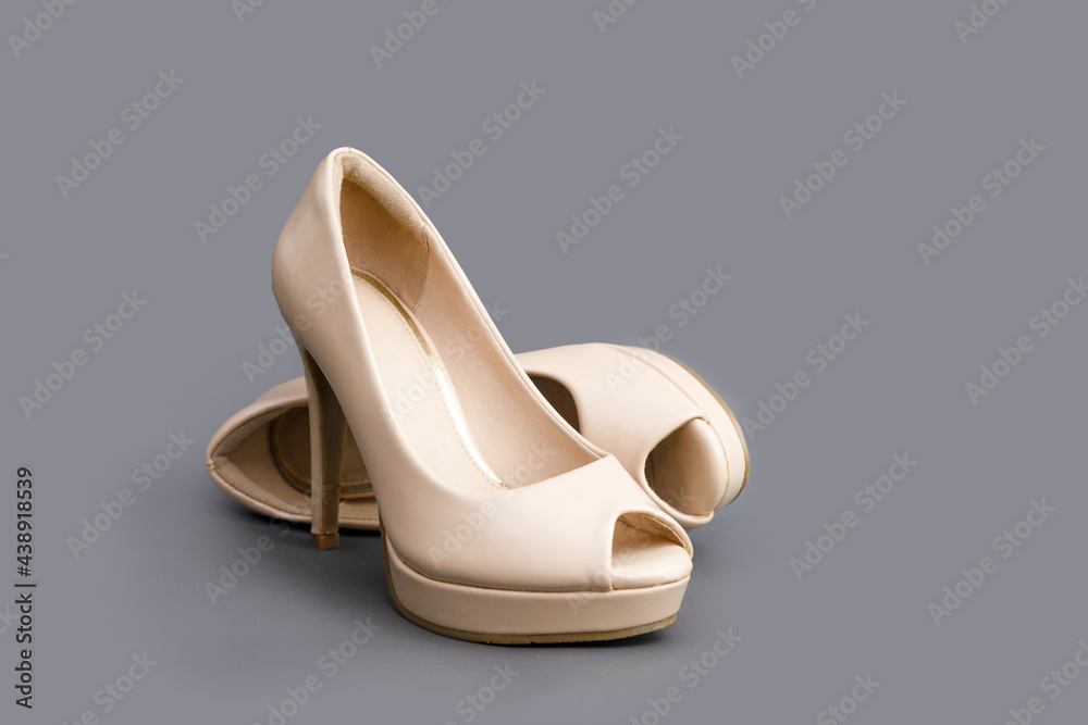 stiletto heels shoes for catalogue. elegant high heels on a grey background. attractive heels images for boutique catalogues.