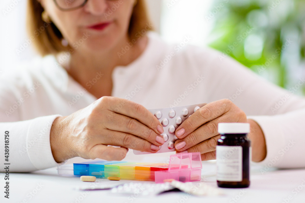 Pill box for senior patient. Medicine container.